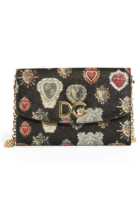 dolce gabbana heart clutch|Dolce & Gabbana leather wallet.